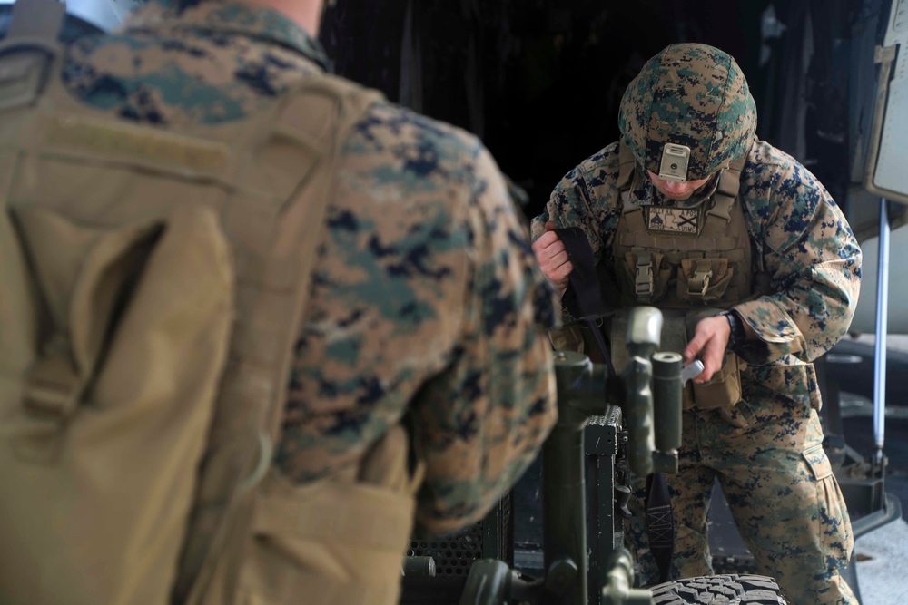U.S. Marines Prepare to board an MV-22 Osprey