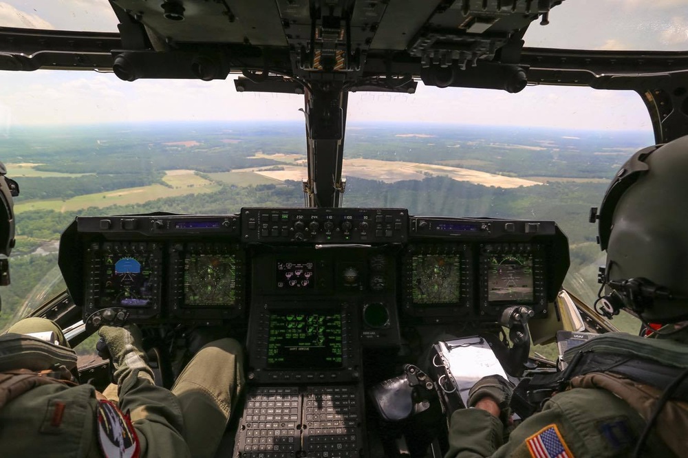 Pilots with VMMT-204 soar into sunset in MV-22 Osprey