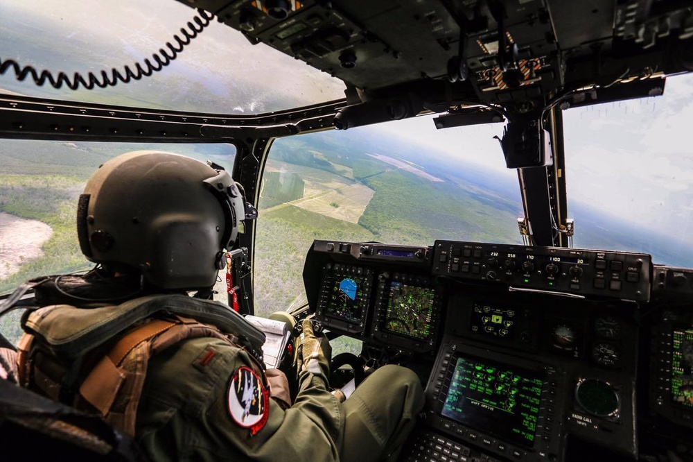 Pilots with VMMT-204 soar into sunset in MV-22 Osprey