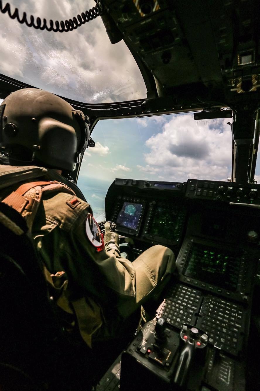 Pilots with VMMT-204 soar into sunset in MV-22 Osprey