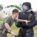 SPMAGTF-CR-AF Marines conduct non-lethal weapons training
