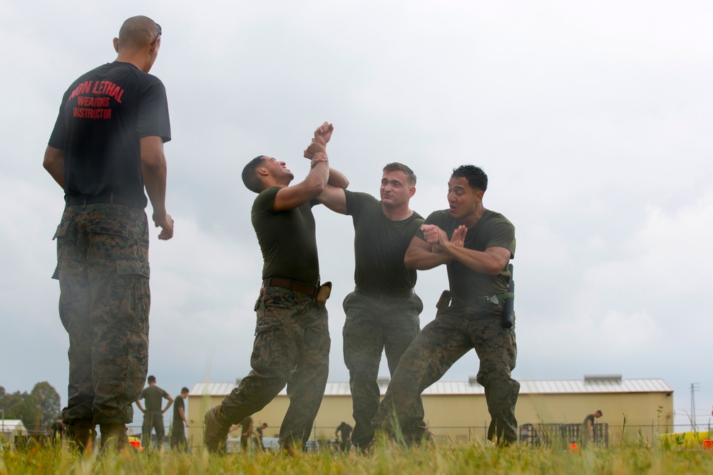 SPMAGTF-CR-AF Marines conduct non-lethal weapons training SPMAGTF-CR-AF Marines conduct non-lethal weapons training