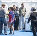 Elizabeth Marks gives Prince Harry her medal
