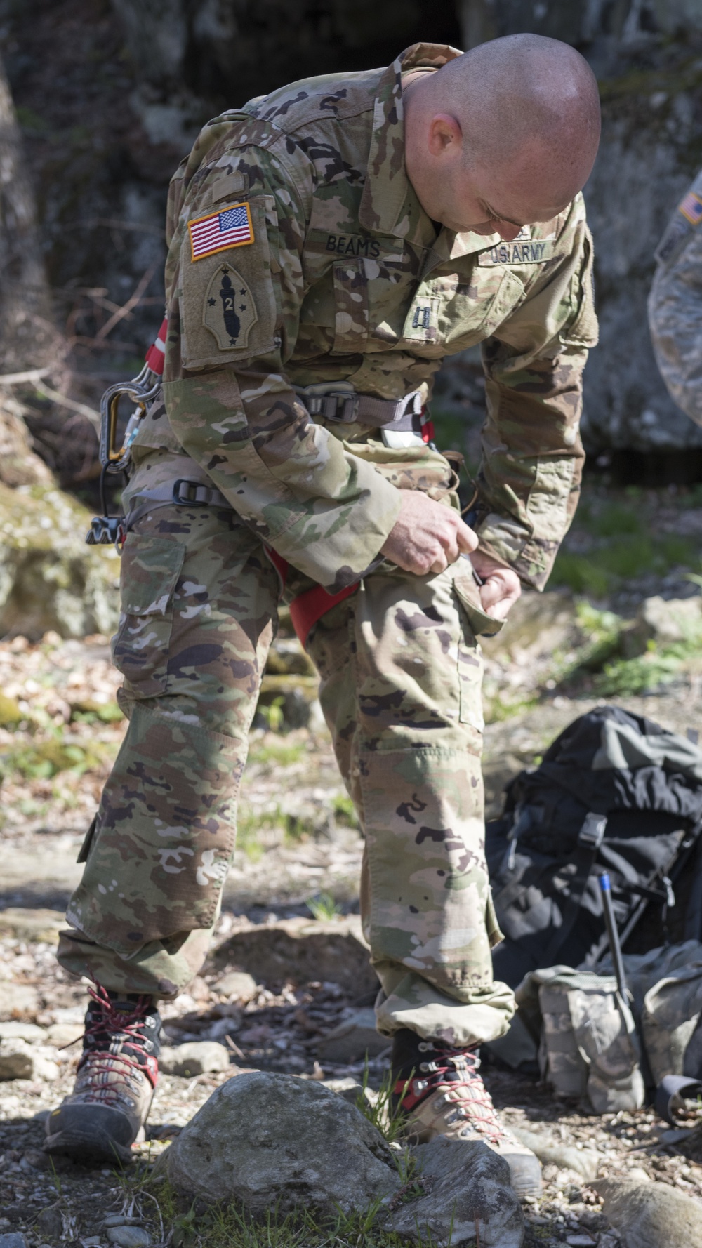 Soldier Dons Mountain Climbing Gear