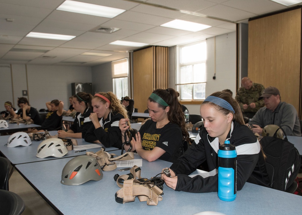 Soccer Players Check Their Gear