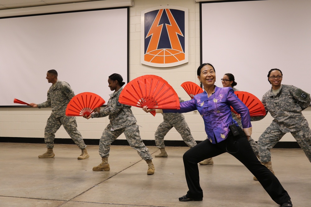 Hwee-Eng Y. Lee teaches soldiers a Kung Fu Fan Dance