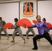 Hwee-Eng Y. Lee teaches soldiers a Kung Fu Fan Dance