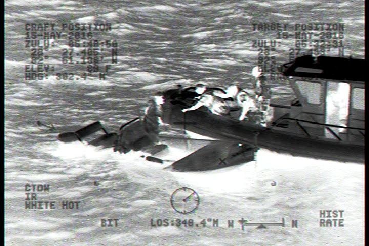 Coast Guard rescues 2 adults, 2 children after boat takes on water