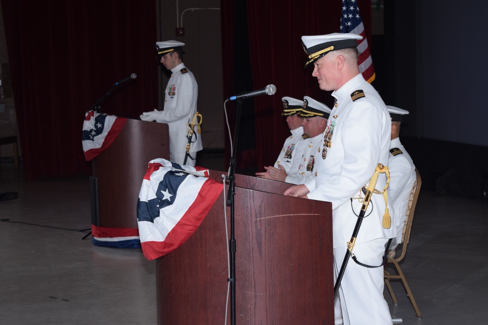 Cmdr. Brian Turney makes his first remarks as commanding officer of USS Chicago (SSN 721) during the change of command ceremony at Naval Base Guam May 12