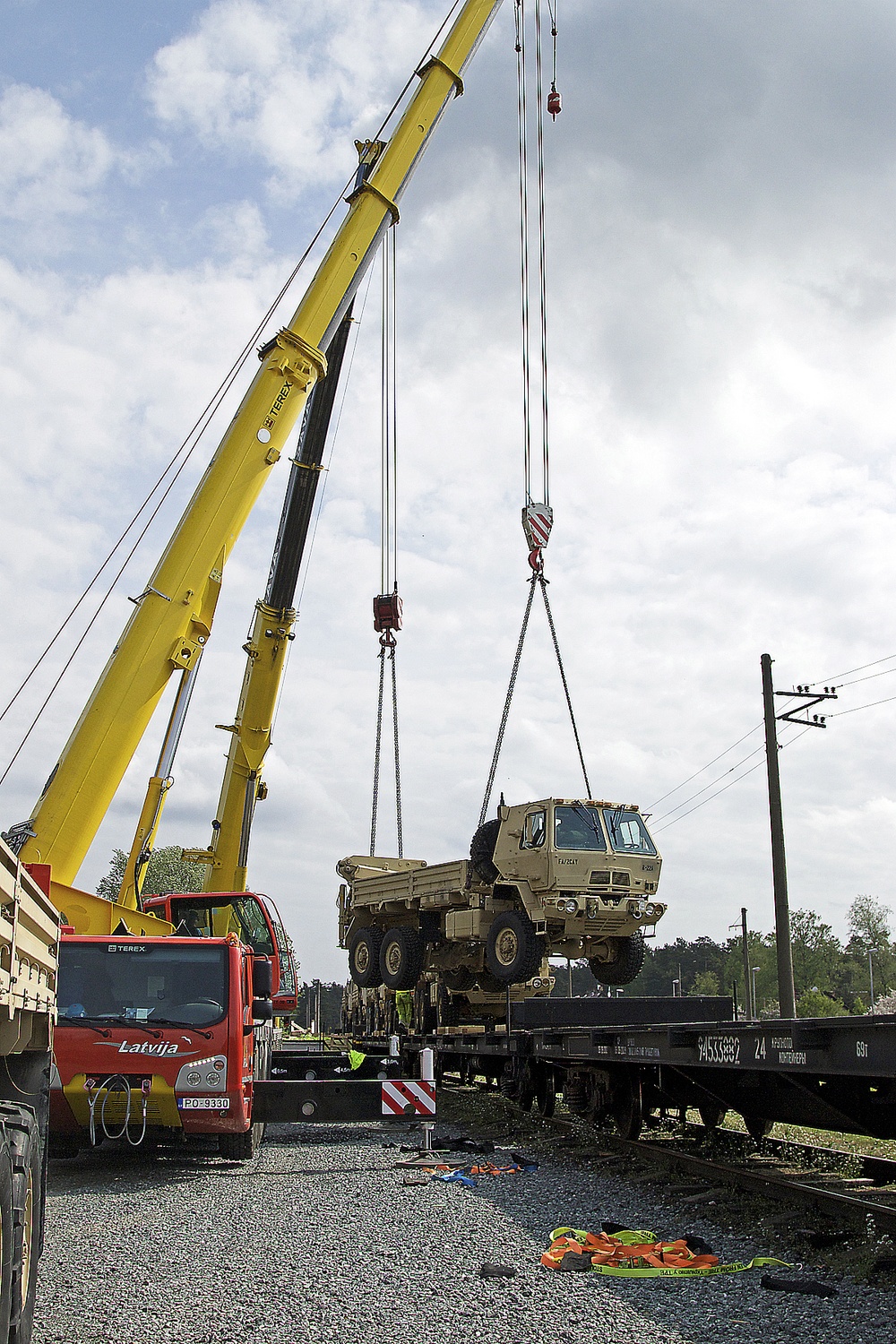 Cranes, trains, automobiles bring 2/2 CR to Latvia
