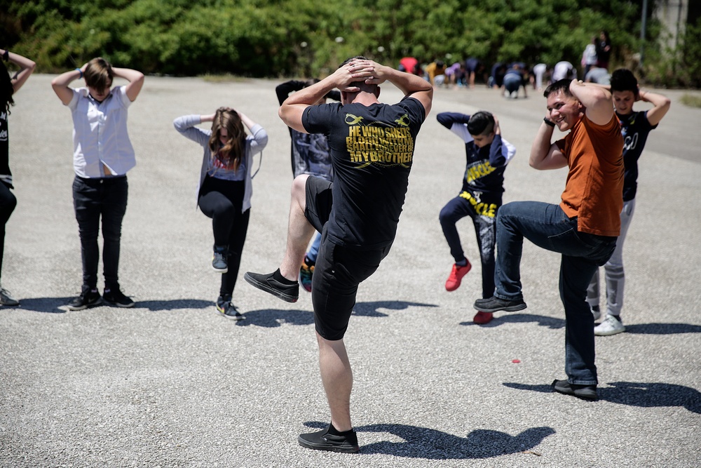 Marines teach nutrition, fitness, English to Italian children