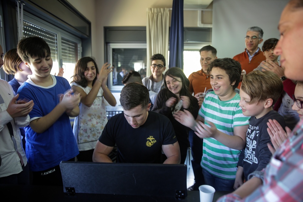 Marines teach nutrition, fitness, English to Italian children