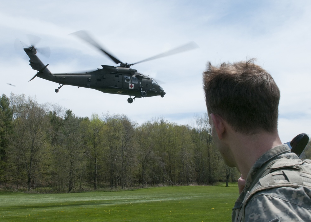 Soldier Watches Black Hawk Takeoff