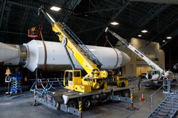 NMUSAF restoration staff teams with AFRL engineers to display Titan IVB in new building