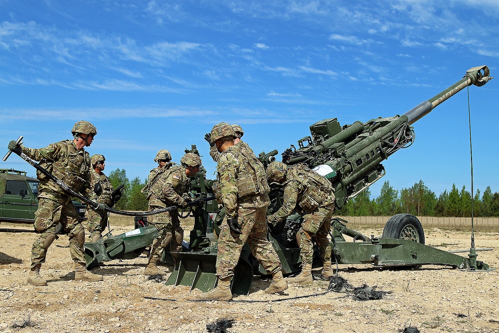 Latvian Ministry of Defence officials view Howitzer demonstration