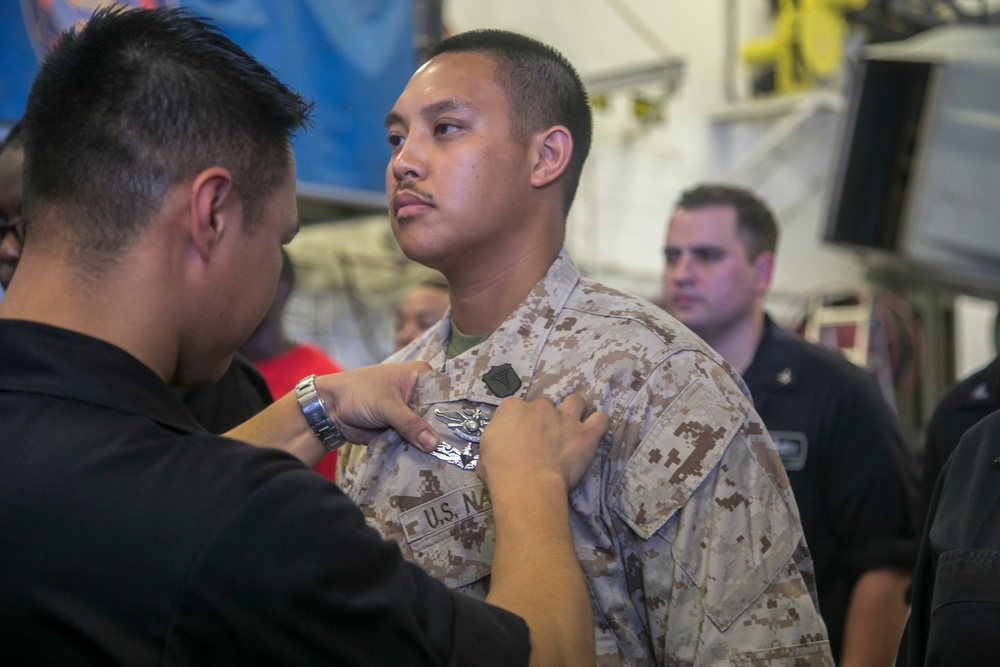 13TH MEU Corpsmen receive Enlisted Warfare Specialist pin
