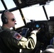 Coast Guard HC-130 Hercules aircraft pilot performs in-flight operations