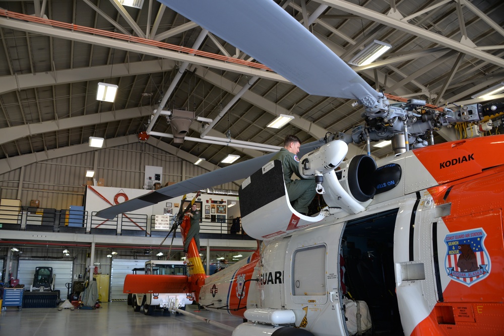 Coast Guard aircrew prepares MH-60 Jayhawk helicopter in Cordova, Alaska