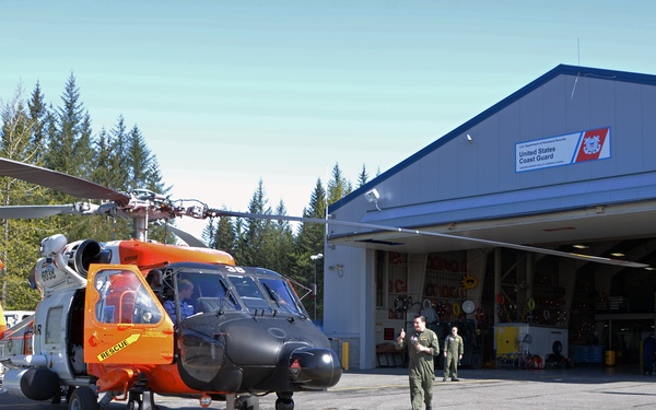 Coast Guard aircrew prepares MH-60 Jayhawk helicopter in Cordova, Alaska