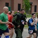 119 Wing EOD technician runs 5K in protective suit