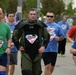 119 Wing EOD technician runs 5K in protective suit