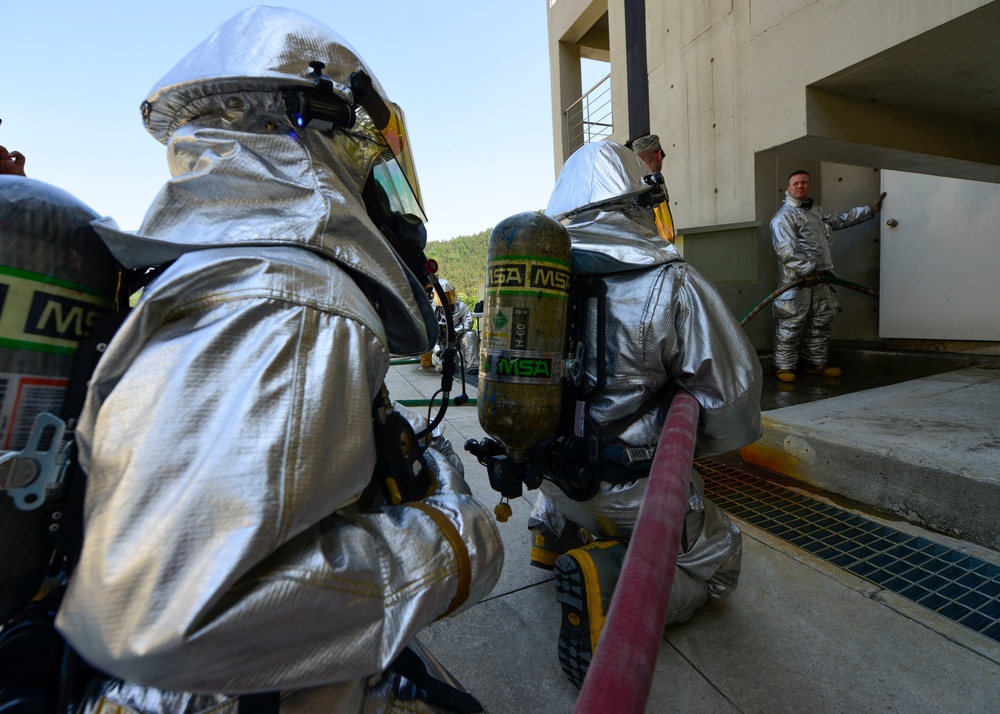 Live fire training partners Airmen with local firefighters