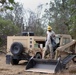 Soldier cleans out Skit-Steer Loader