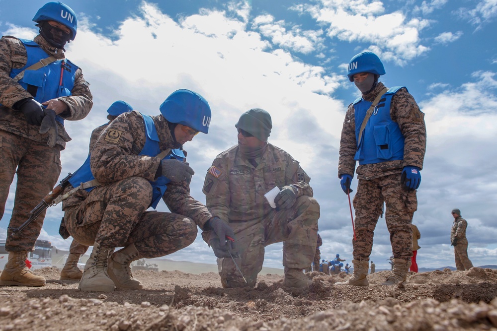 Soldiers with the Mongolian Armed Forces participate in minefield self-extraction training during Khaan Quest 2016
