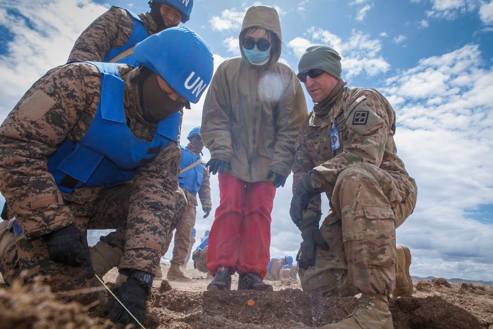 Soldiers with the Mongolian Armed Forces participate in minefield self-extraction training during Khaan Quest 2016