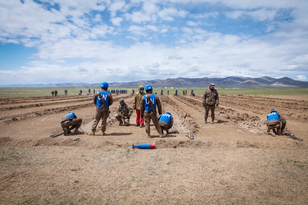 Soldiers with the Mongolian Armed Forces participate in minefield self-extraction training during Khaan Quest 2016