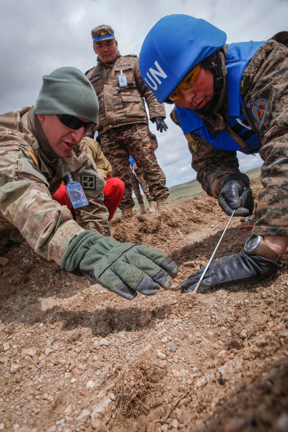 Soldiers with the Mongolian Armed Forces participate in minefield self-extraction training during Khaan Quest 2016