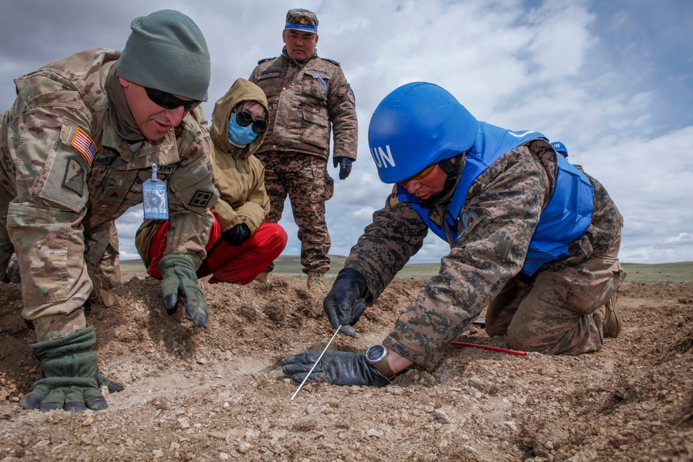 Soldiers with the Mongolian Armed Forces participate in minefield self-extraction training during Khaan Quest 2016