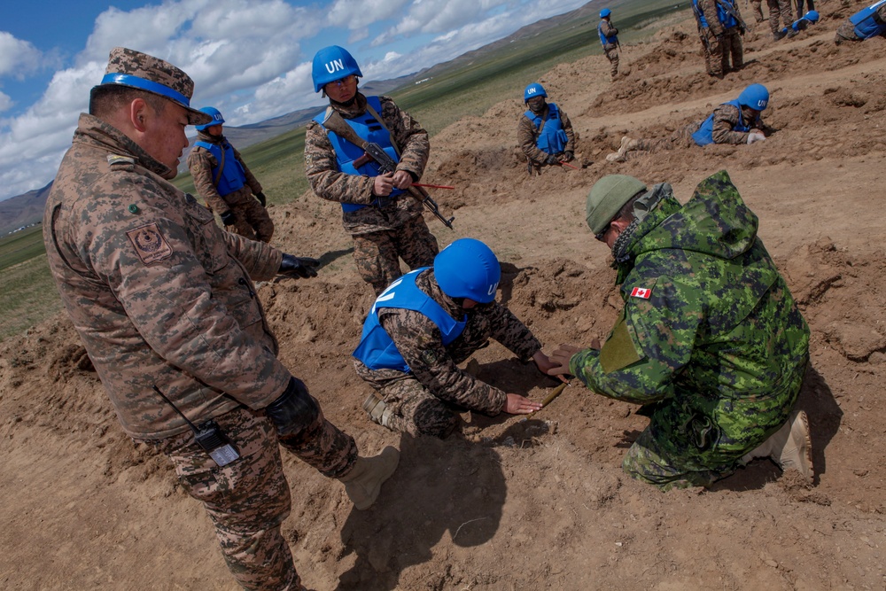 Soldiers with the Mongolian Armed Forces participate in minefield self-extraction training during Khaan Quest 2016