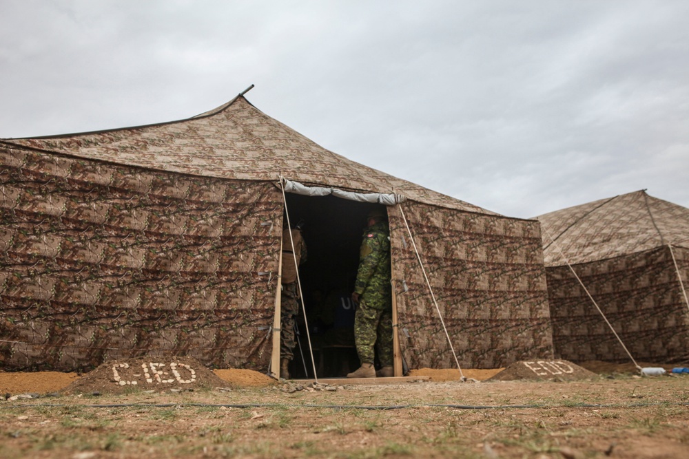 Soldiers with the Mongolian Armed Forces participate in minefield self-extraction training during Khaan Quest 2016