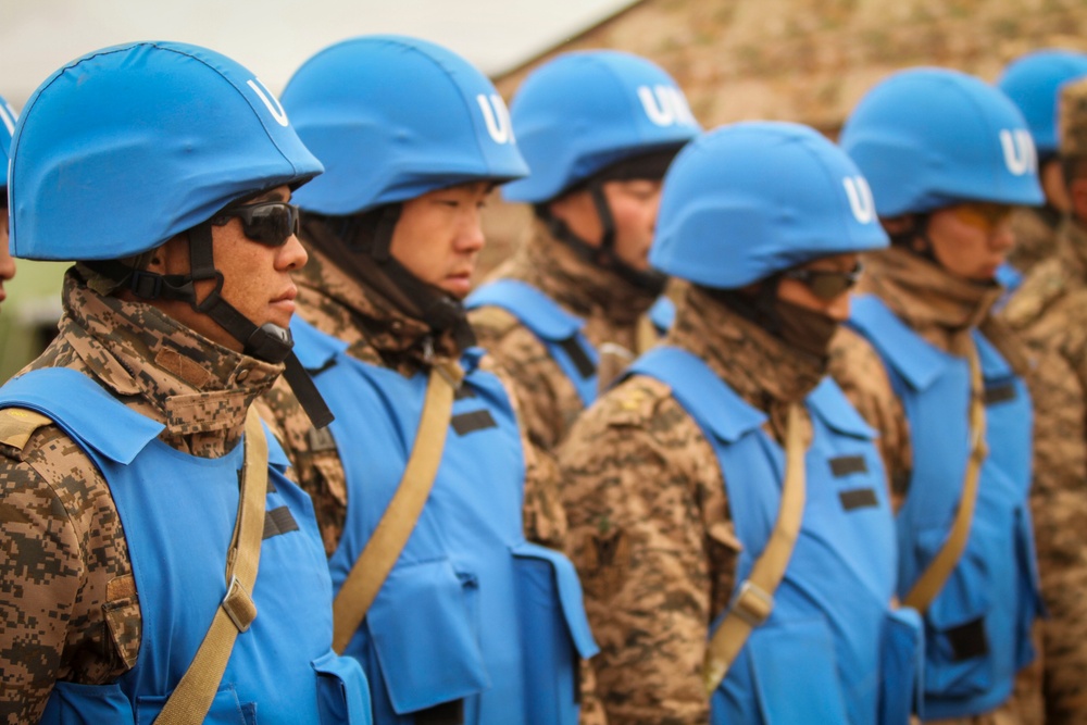 Soldiers with the Mongolian Armed Forces participate in minefield self-extraction training during Khaan Quest 2016