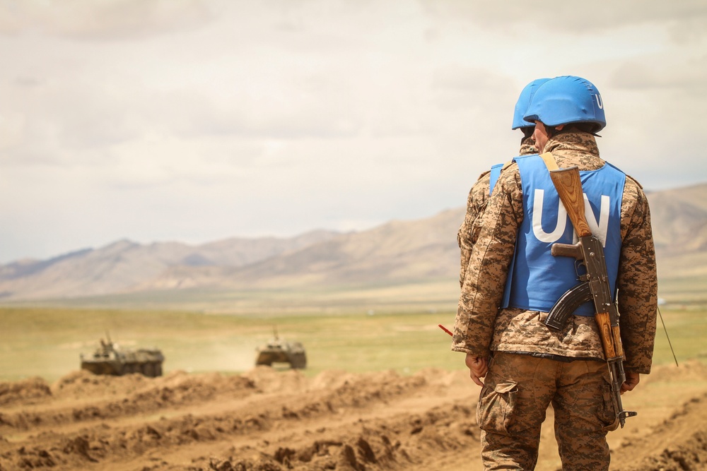 Soldiers with the Mongolian Armed Forces participate in minefield self-extraction training during Khaan Quest 2016