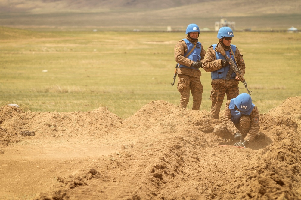 Soldiers with the Mongolian Armed Forces participate in minefield self-extraction training during Khaan Quest 2016