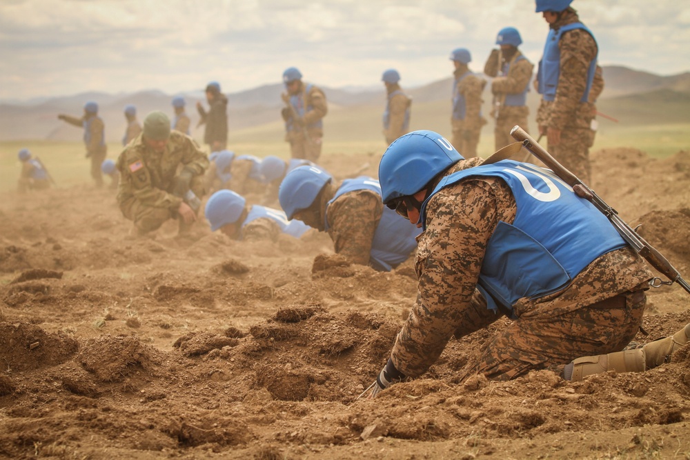 Soldiers with the Mongolian Armed Forces participate in minefield self-extraction training during Khaan Quest 2016