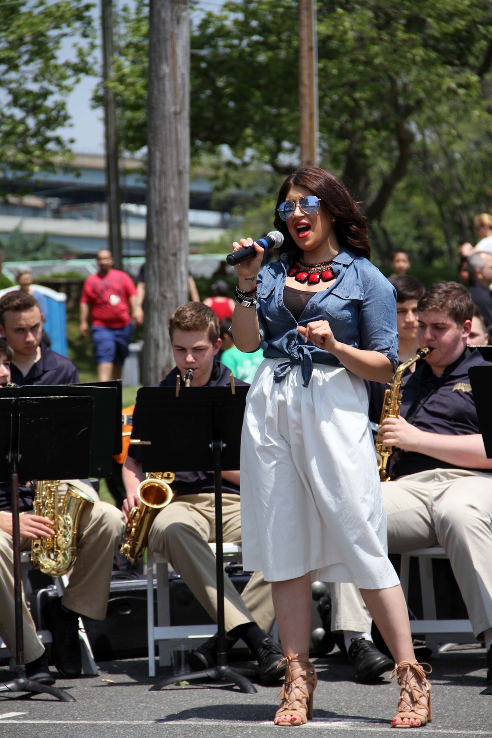 Melissa Fiore performs for Fleet Week Ship Parade crowd