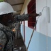 Louisiana National Guard Soldiers power through finishing touches on Catarina school building