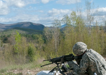 Soldier Fires M-249