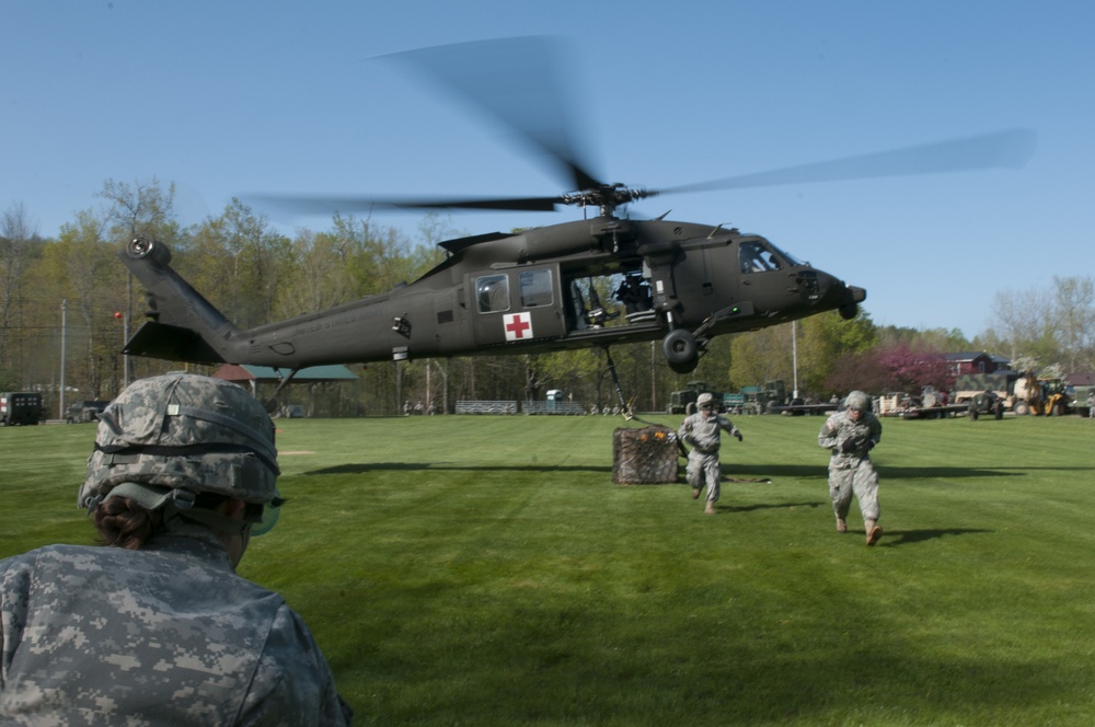Soldiers Exit from Underneath Black Hawk