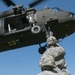 Soldiers Attach Sling Load to Black Hawk