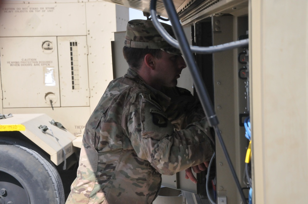 Task Force Strike signal Soldiers maintain communication lines