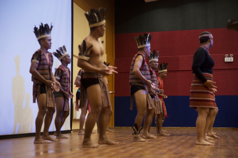 Members of the Armed Forces of the Philippines share culture through song, dance