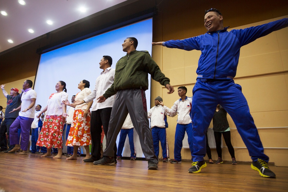 Members of the Armed Forces of the Philippines share culture through song, dance