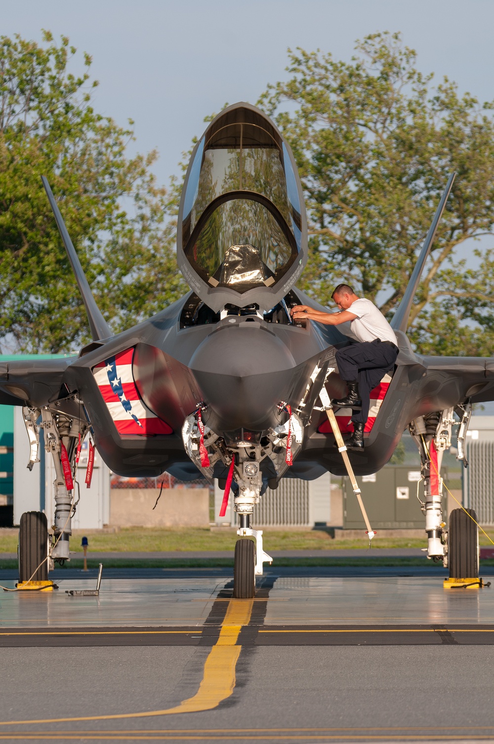 Crew chief climbs F-35 Lightining II ladder at Atlantic City Air National Guard Base