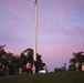 Visitors photograph sunrise in Arlington National Cemetery