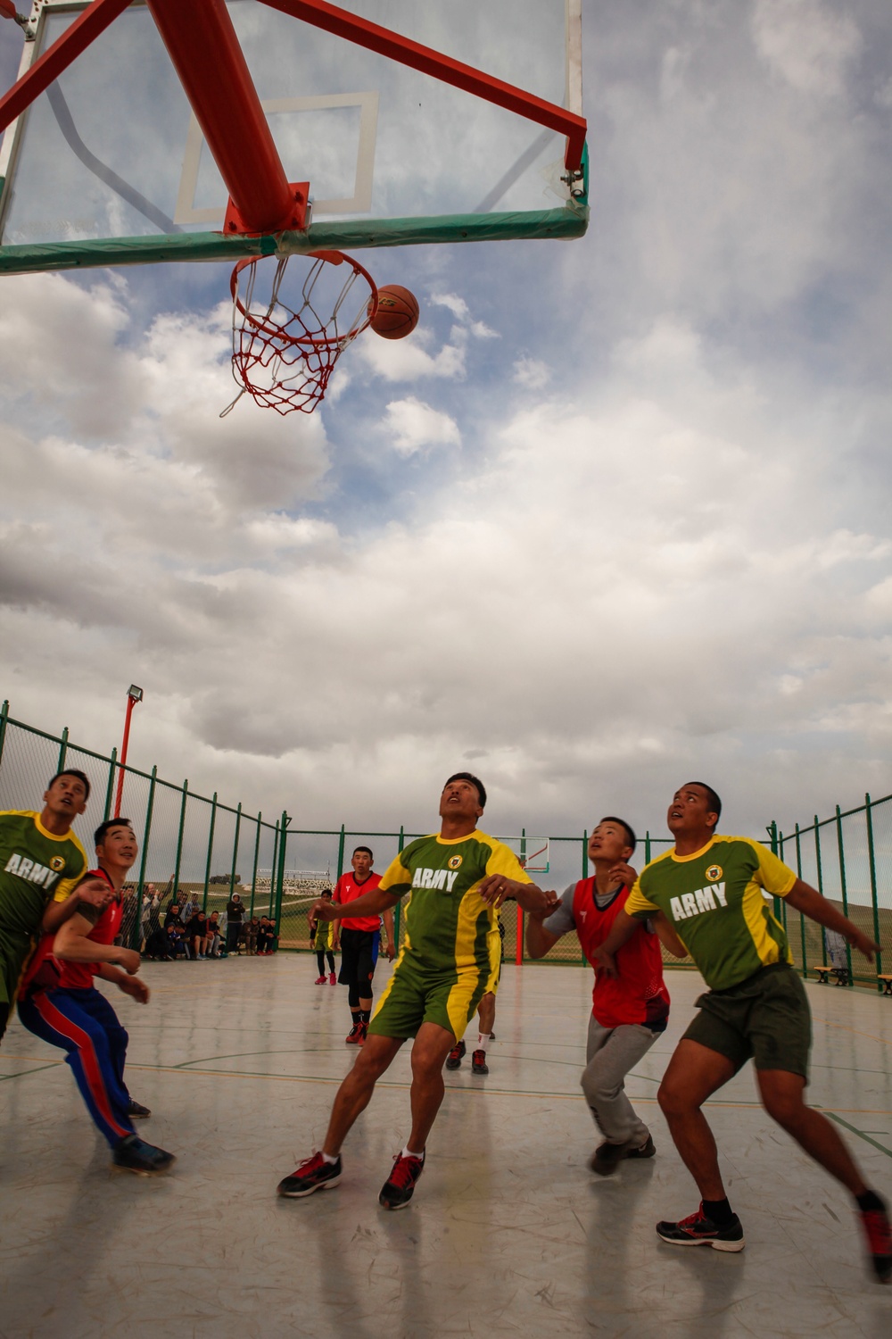 Multinational service members participate in a basketball tournament during Khaan Quest 2016