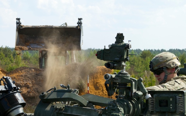 Latvian Engineer build berms for barriers